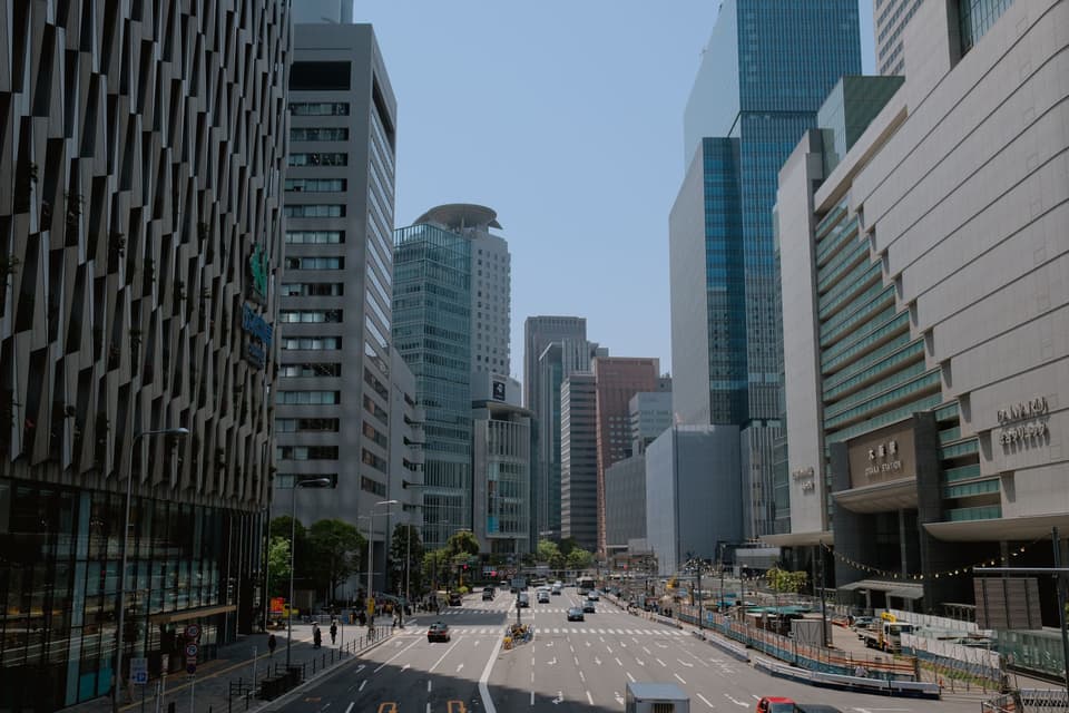 High-rise buildings in a bustling city center reflecting modern architecture.