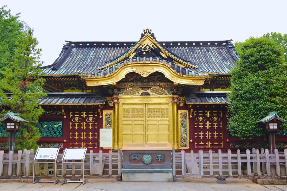 Front view of the historical Toshogu Shrine, a cultural landmark in Ueno Park, Tokyo, Japan.