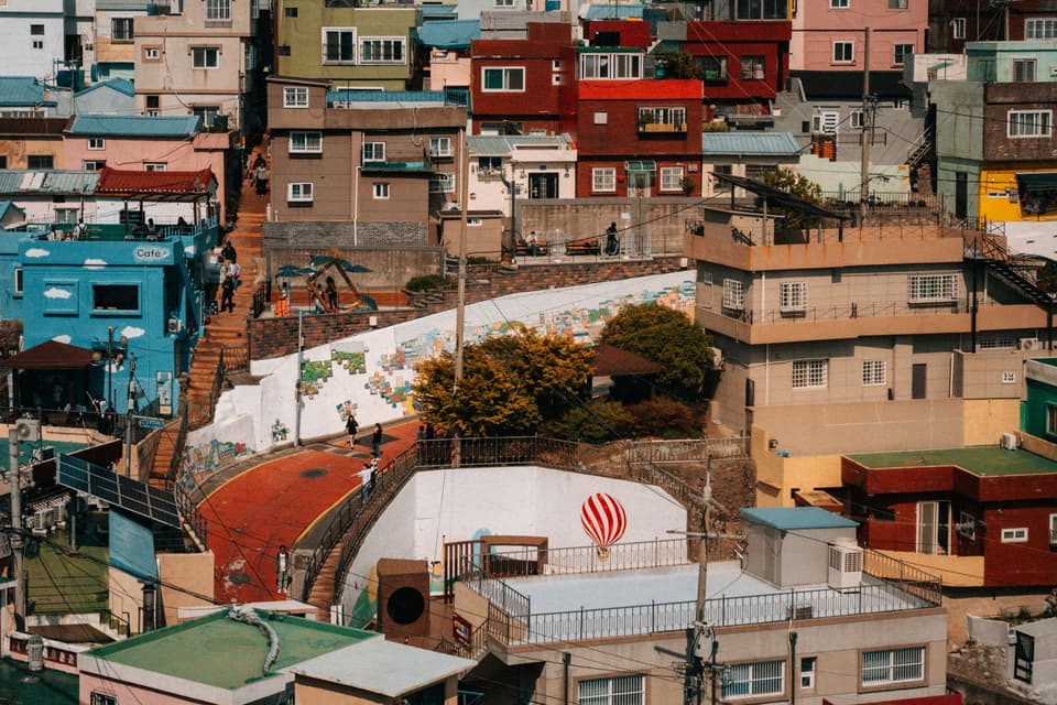 Explore the vibrant colors and unique architecture of Gamcheon Culture Village in Busan, South Korea.