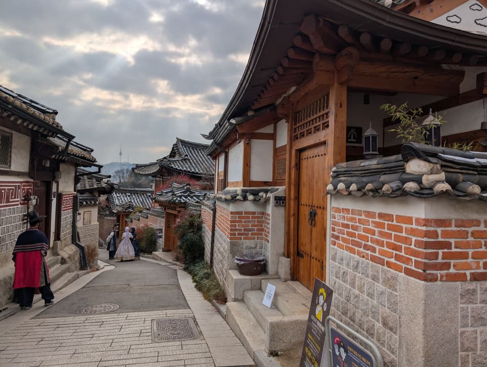 Explore the traditional charm of Bukchon Hanok Village in Seoul, South Korea.